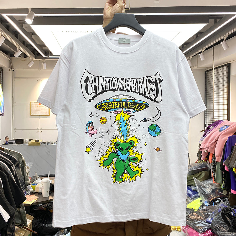 R&G Boutique Star Man cartoon print short sleeve t-shirt featuring a colorful star character on the front.