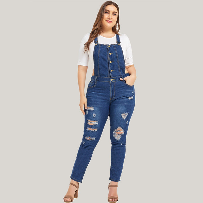 Ripped denim overalls from R&G Boutique featuring distressed details and adjustable shoulder straps.