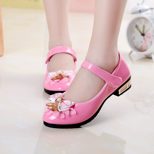 Creative Bowknot cute girls' leather shoes from R&G Boutique, featuring a charming bowknot design and smooth leather material.