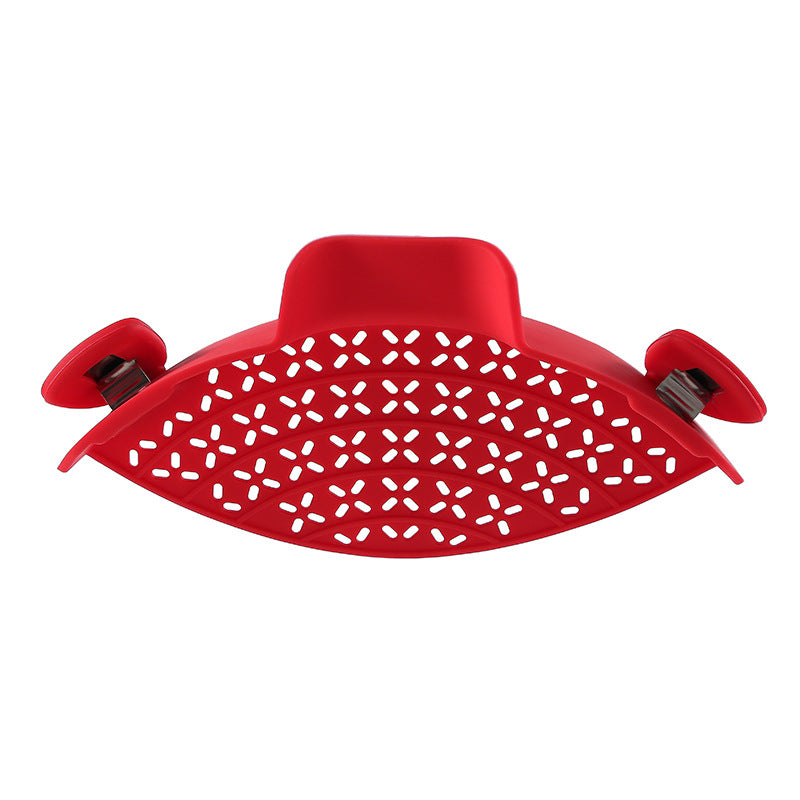 R&G Boutique silicone pot side drain stopper in bright red, designed to prevent spills and easily fit on kitchen pots.