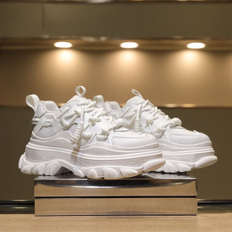 Women's casual leather lace-up platform sneakers by R&G Boutique with thick soles and stylish design.