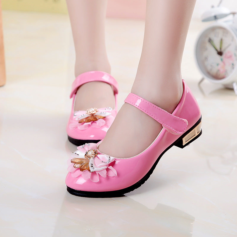 Creative Bowknot cute girls' leather shoes by R&G Boutique featuring a stylish bowknot design and soft leather material.